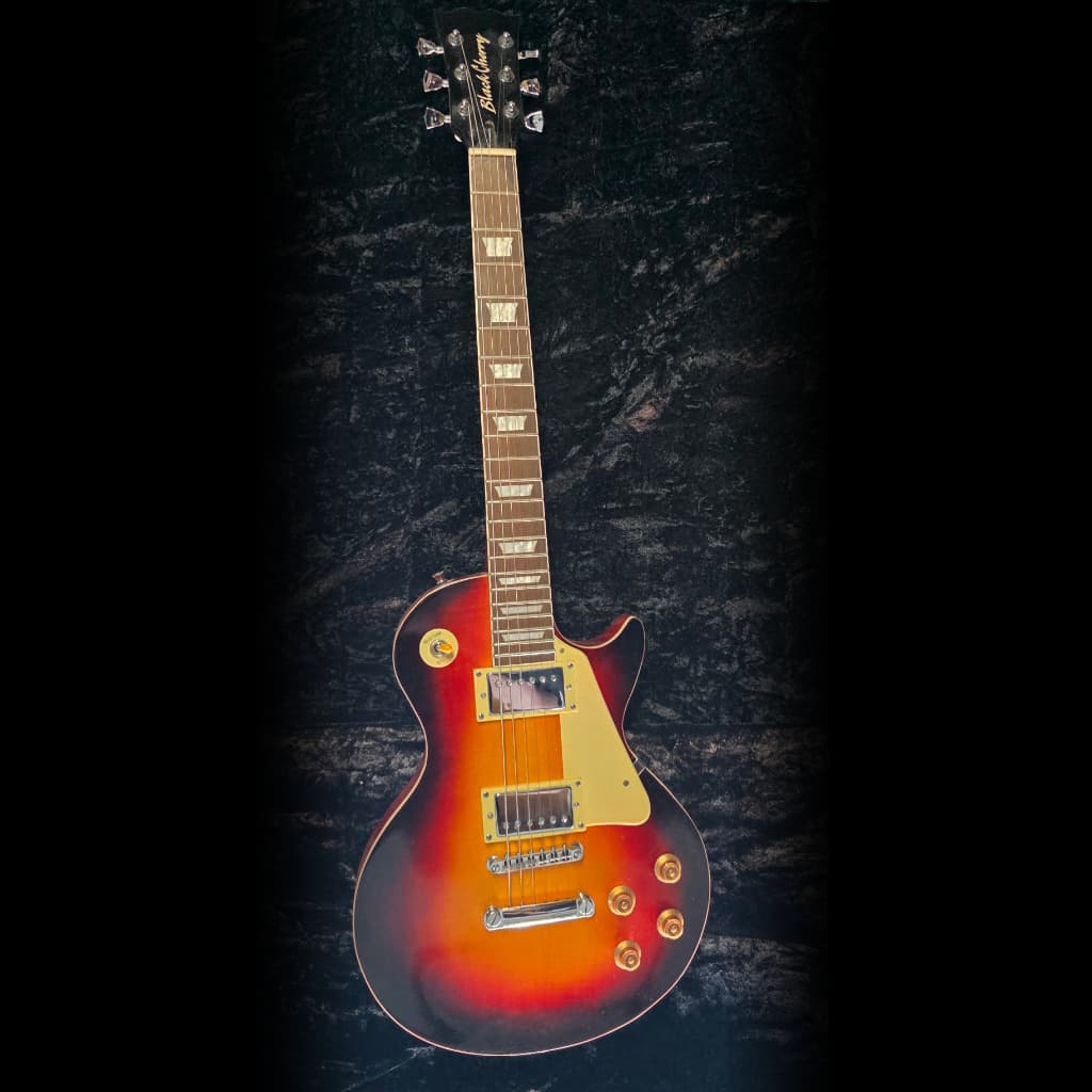 Guitar detail shot showing hardware and fretboard.